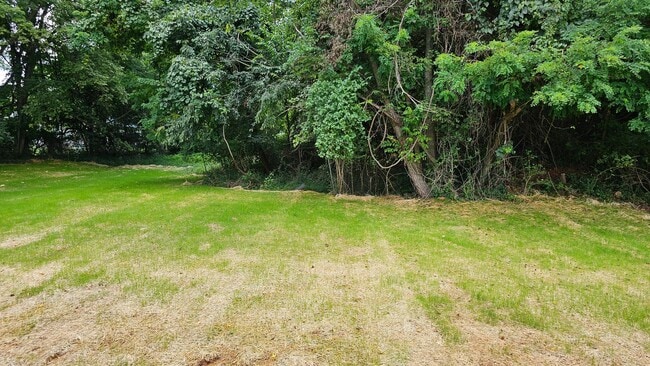 Building Photo - Built in 2024! Close to downtown 2 Bed/2.5 Bath. Nice private backyard with trees