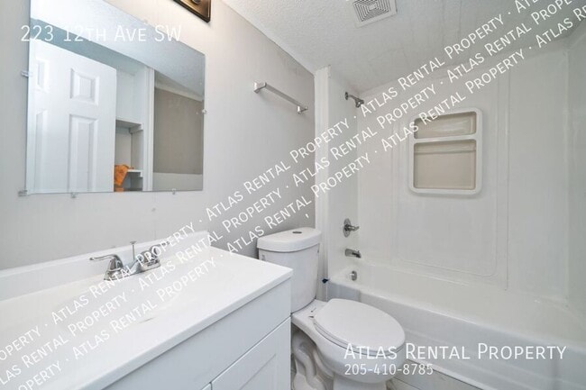 Building Photo - 223 12th Ave SW