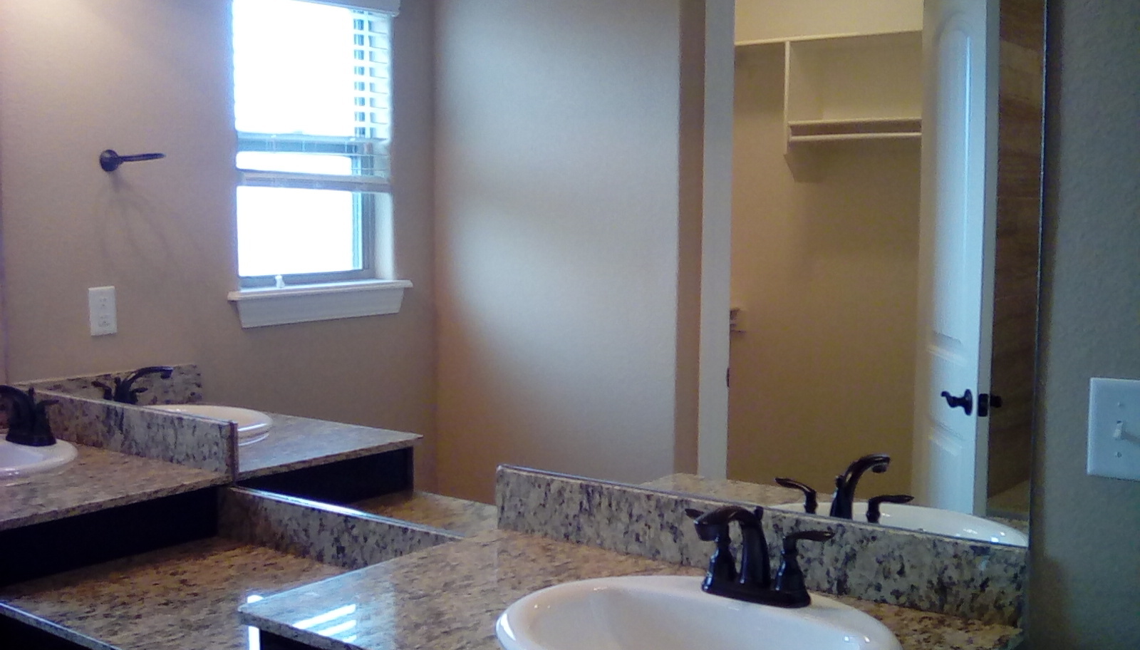 double granite vanity in master bath. - 4887 w croft