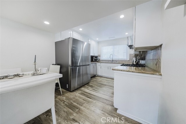 Building Photo - 6667 Wilbur Ave