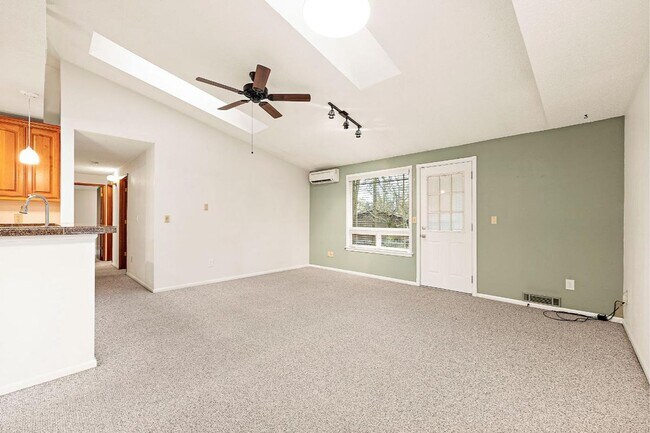 Building Photo - Charming Tacoma Home with A/C, RV Parking, Workshop & Skylit Living Room