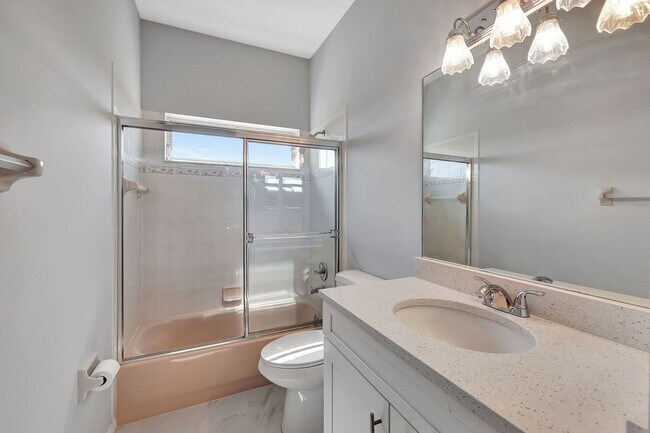 Building Photo - A BOATER'S PARADISE WITH THIS STUNNING 3 BEDROOM, 2 BATH WATERFRONT POOL HOME W/DOCK & BOAT LIFT ...