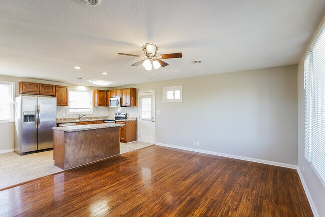 Building Photo - Charming 4-Bedroom Home with Spacious Lawn