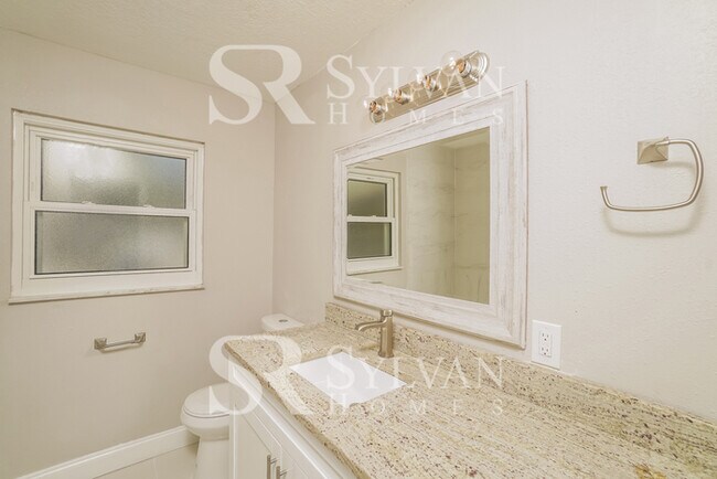 Building Photo - Spacious, Modern Home-style Living.