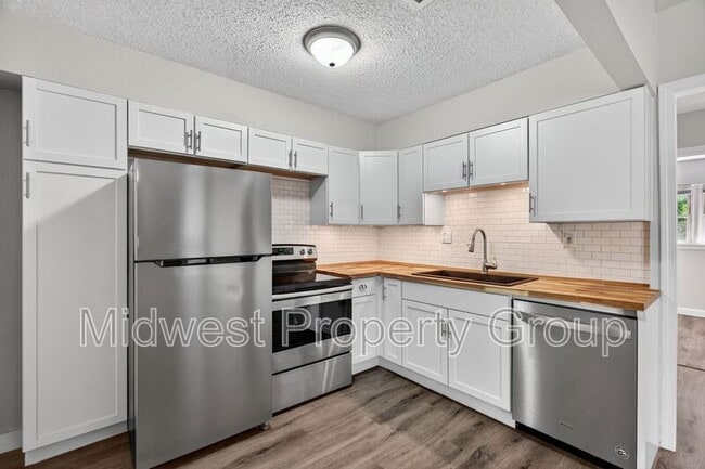 Building Photo - 7348 Lynn Ave