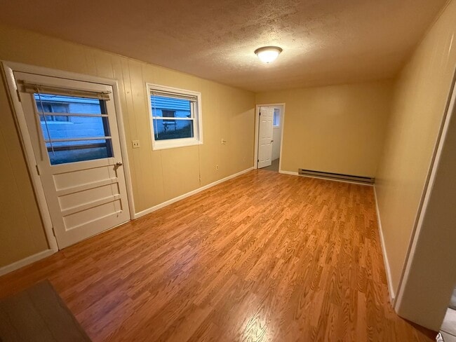 Building Photo - Updated 4BR Home with Finished Basement & Level Yard