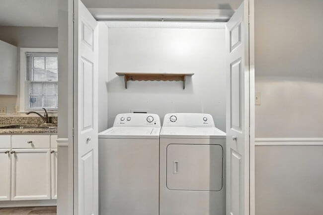 Building Photo - Spacious 2-Bedroom, 2.5-Bath End-Unit Town...