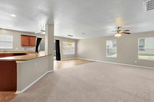 Building Photo - "Spacious 4-Bedroom Sanctuary with 3 Full ...