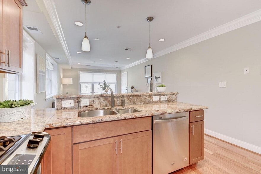 Kitchen island with pendant lighting - 5511 Colorado Ave NW