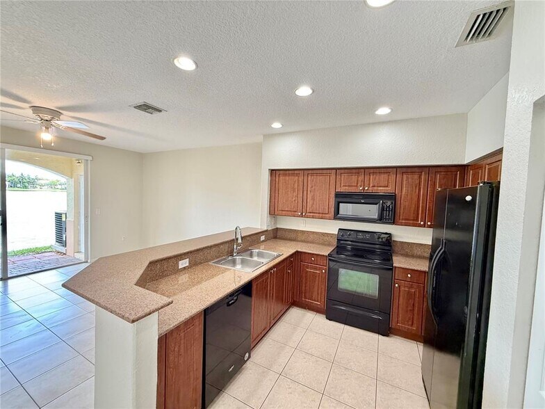 Building Photo - 8380 SW 25th Ct
