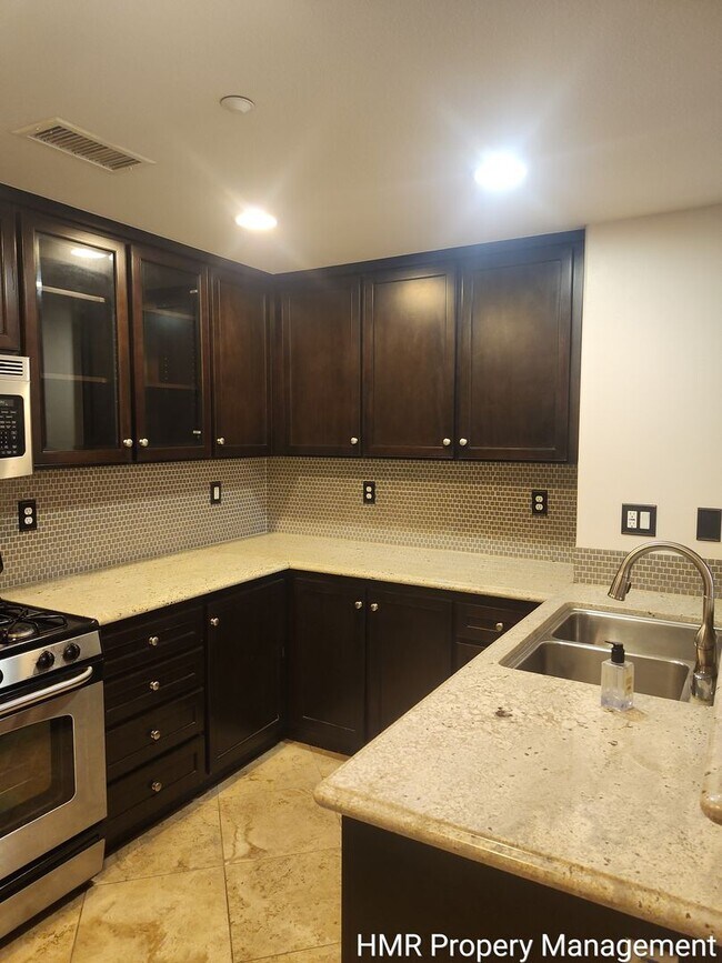 Building Photo - Modern 2-Bedroom Condo Near Victoria Gardens