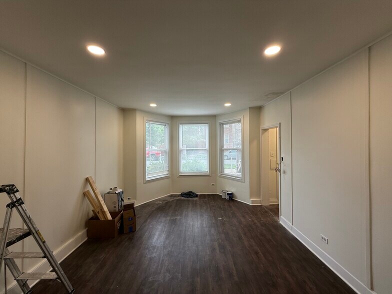 UPDATED living room with recessed lighting - 3350 W Cuyler Ave