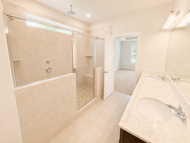 Building Photo - Better Than New | Ranch Home with Flex Room, 3-Head Spa Shower, Covered Outdoor Living & Premium ...
