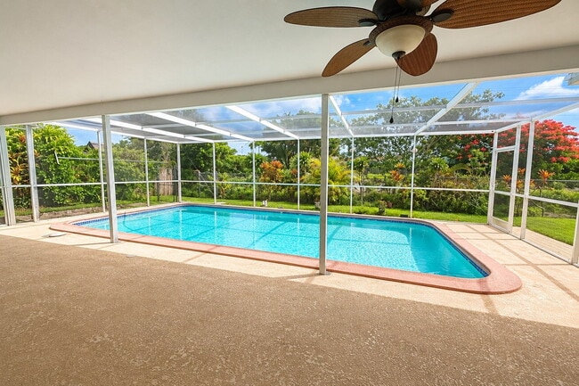 Building Photo - "Spacious & Renovated 4-Bed Oasis with Pool in Boca Raton - 2136 Sq Ft of Elegance!"