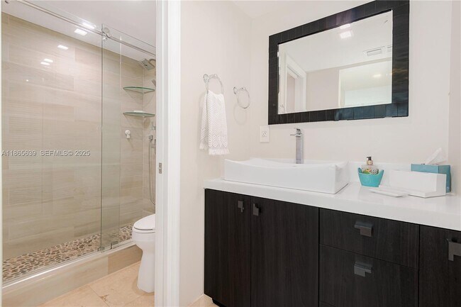 Building Photo - 6917 Collins Ave