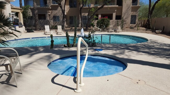 Building Photo - Luxurious 2-Bed/2-Bath Condo in Quiet Gated Community - Coming Soon!