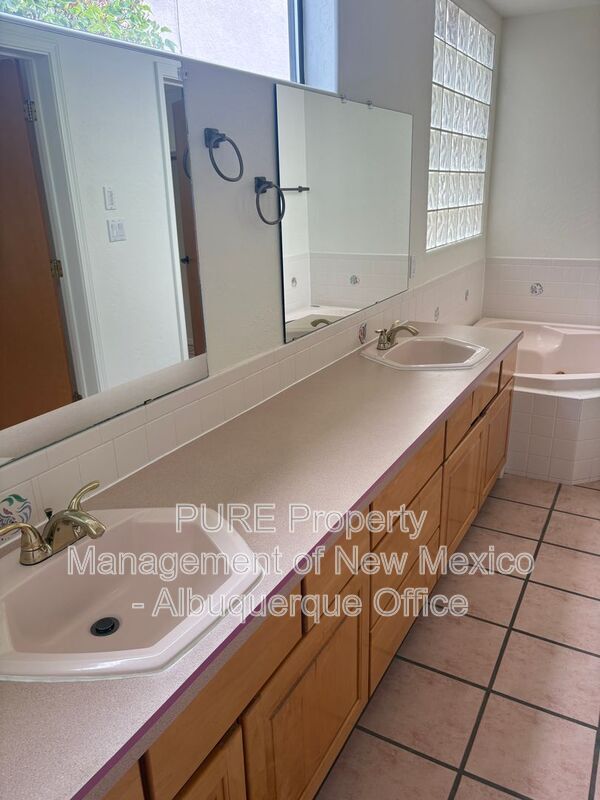 Building Photo - 8220 W Raintree Dr NE