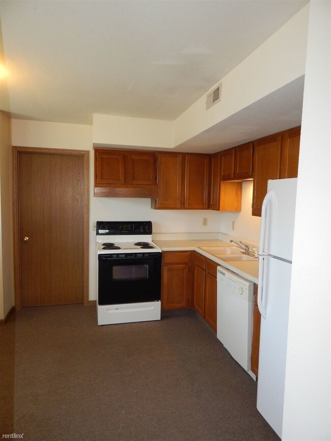 Building Photo - 2 br, 1 bath Apartment - G.T. Woods Proper...
