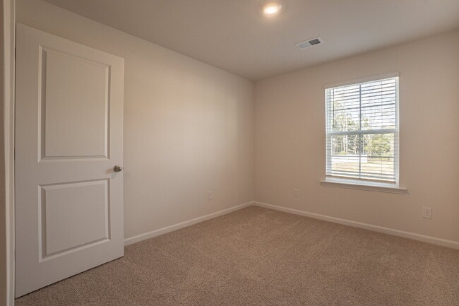 Building Photo - End unit! Available Early June!