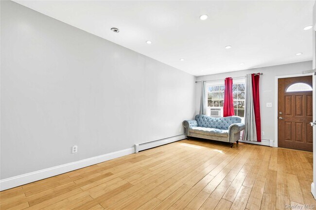 Building Photo - 228-07 146th Ave