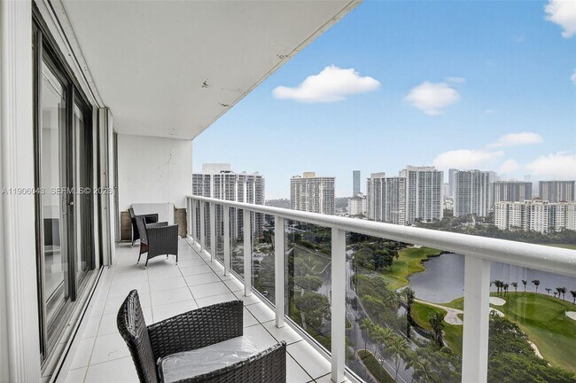 Building Photo - 3675 N Country Club Dr