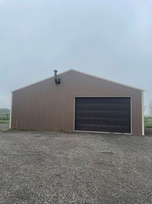 Building Photo - Charming Log Home For Rent with Large Shop & Spacious Yard