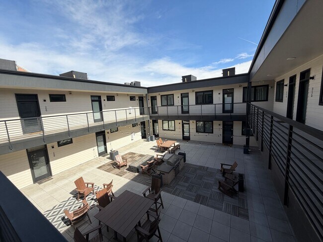 Building Photo - Top-Floor Corner Condo with Downtown Views — Stylish, Pristine, and Steps From Everything