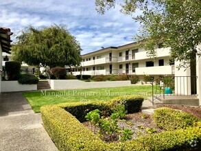 Building Photo - Spacious One-Bed One-Bath Condo Located At...