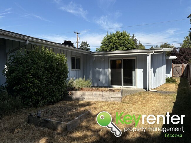 Building Photo - Beautiful 4-Bedroom Rambler in a Desirable...