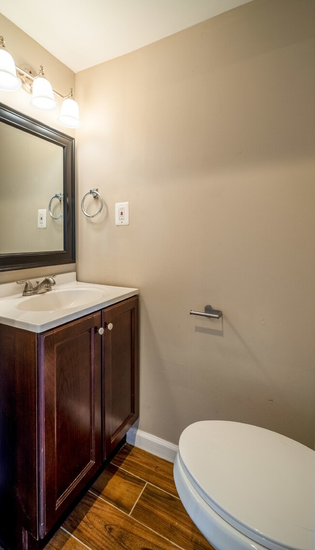 Building Photo - Spacious 3-Level Townhouse with Finished Basement and Fenced Patio