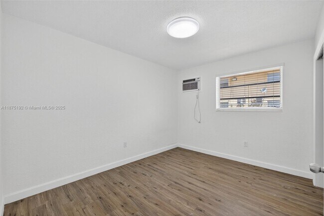 Building Photo - 7155 W 14th Ct
