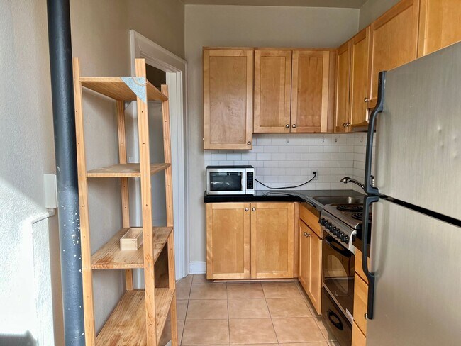 Building Photo - Classic Living at the Novell! Close to UW ...