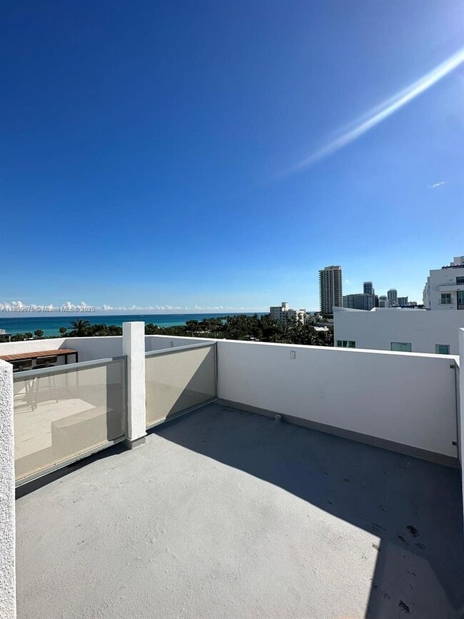 Building Photo - 7728 Collins Ave