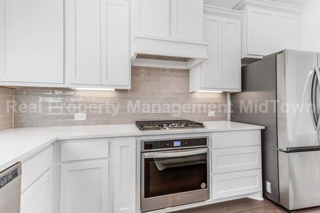 Building Photo - Live Elevated in the Heart of Viridian – S...