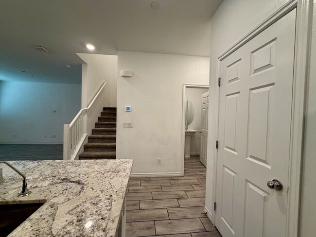 Building Photo - GATED 3 BED 2.5 BATH TOWNHOME WITH 2-CAR GARAGE, COVERED PATIO & COMMUNITY POOL