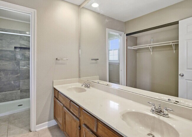 Building Photo - Corner-Lot Garden Home with Fireplace and Private Patio