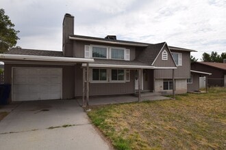 Building Photo - Comfortable Kearns 4-Bed Home with Spacious layout & Private Yard