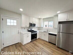Building Photo - Welcome to your beautifully renovated sing...