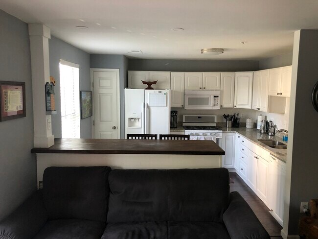 Building Photo - 7518 Snowpea Court, Unit E