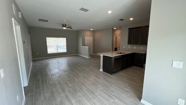 Building Photo - Smart & Stylish 3BD/2BA Palm Bay Home – Modern Upgrades, No Water Bills!