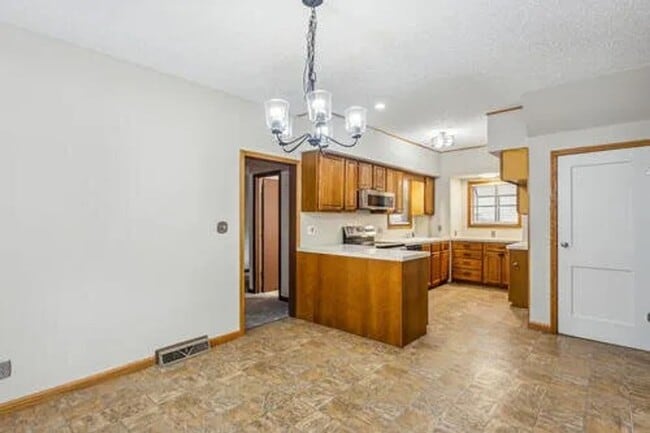 Building Photo - Coming Soon! Beautiful two story home in Winfield that showcases exceptional curb!