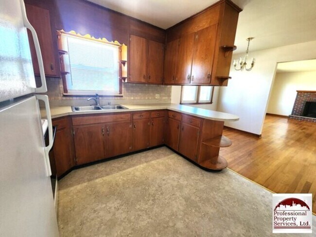 Building Photo - Charming Brick Rancher Offers A Perfect Blend Of Country Living And Convenience