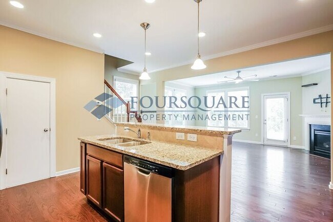 Building Photo - End Unit Townhome | Back Patio With Privac...