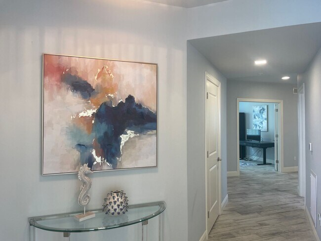Building Photo - Coastal Luxury at Hidden Bay | 3BR Waterfront Condo with Bay Views