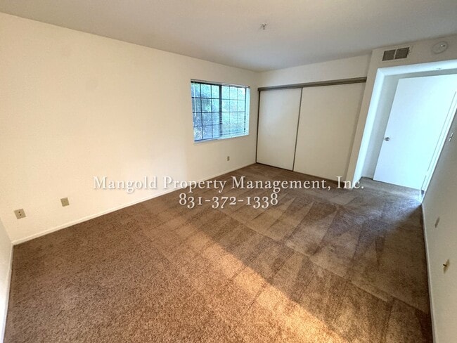Building Photo - Spacious 2-Bed, 2-Bath Condo with Fireplac...