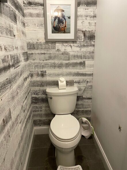 First floor powder room (off kitchen next to laundry) - 11 Oakland St