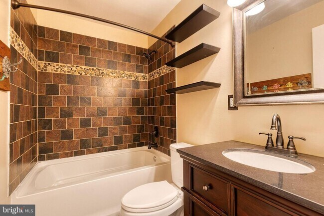 Building Photo - Welcome to The Provinces in Severn MD! Thi...