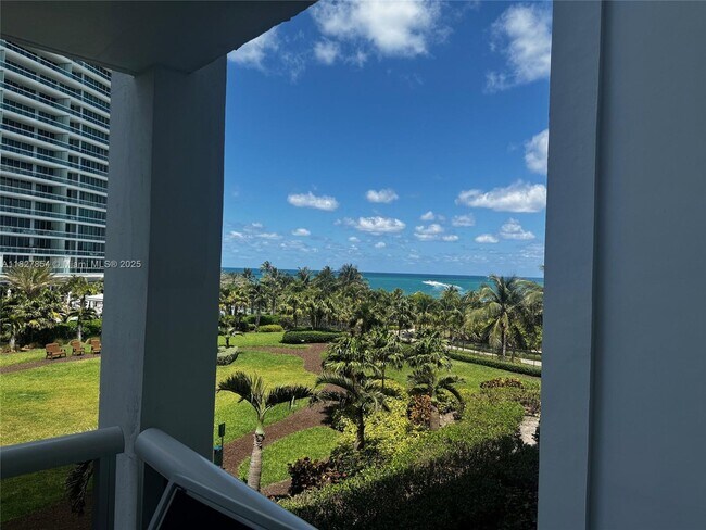 Building Photo - 10275 Collins Ave