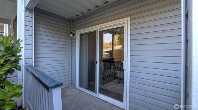 Building Photo - Great location, quiet first floor end unit...