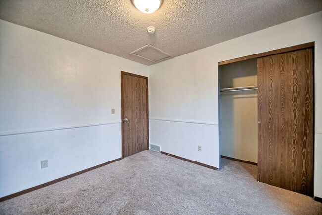 Building Photo - 4-Bedroom Home Near CSU | Fenced Yard & 2-Car Garage